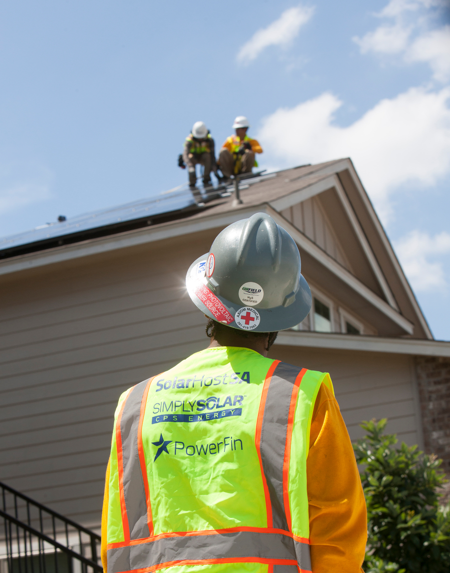 solar workers on roof