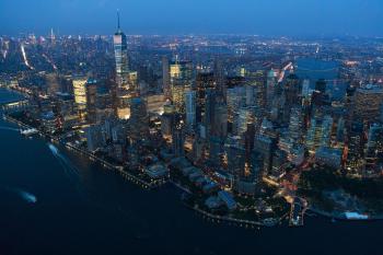 Birds eye view of the skyline of New York city at night.