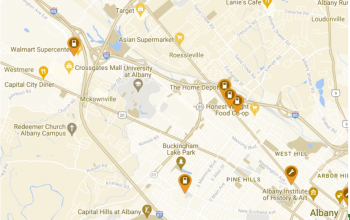 Photo of online map with pins dropped at locations of electric vehicle charging stations.