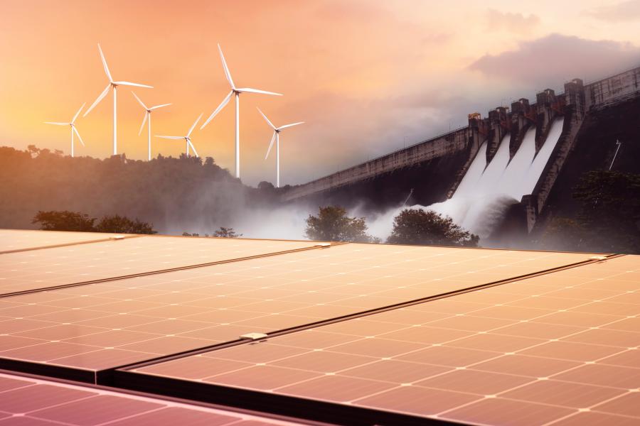 a photo of solar panels, wind turbines, and hydro dams
