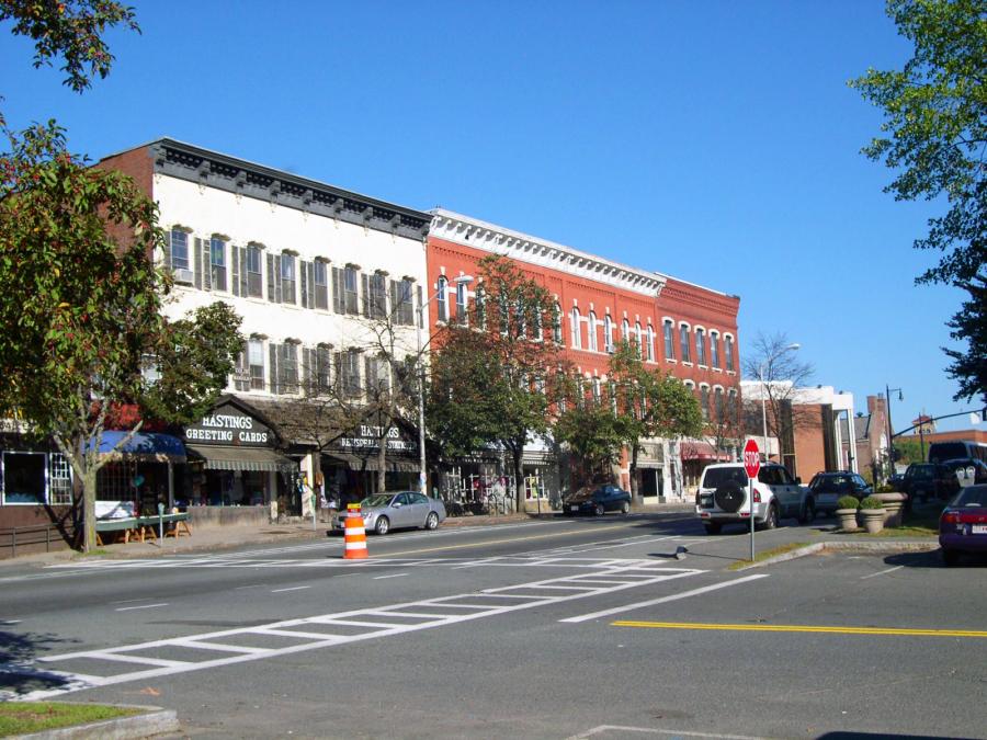 photo of Amherst downtown area with lots of pavement and buildings