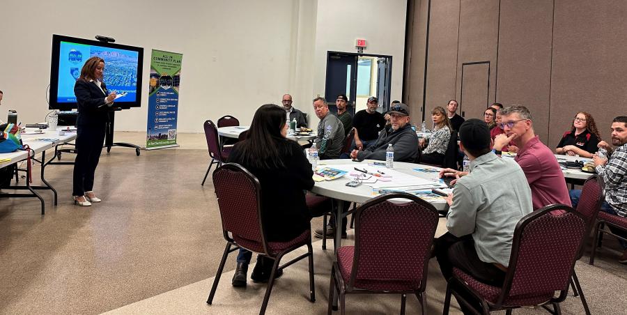 a group of contractors listening to a presentation