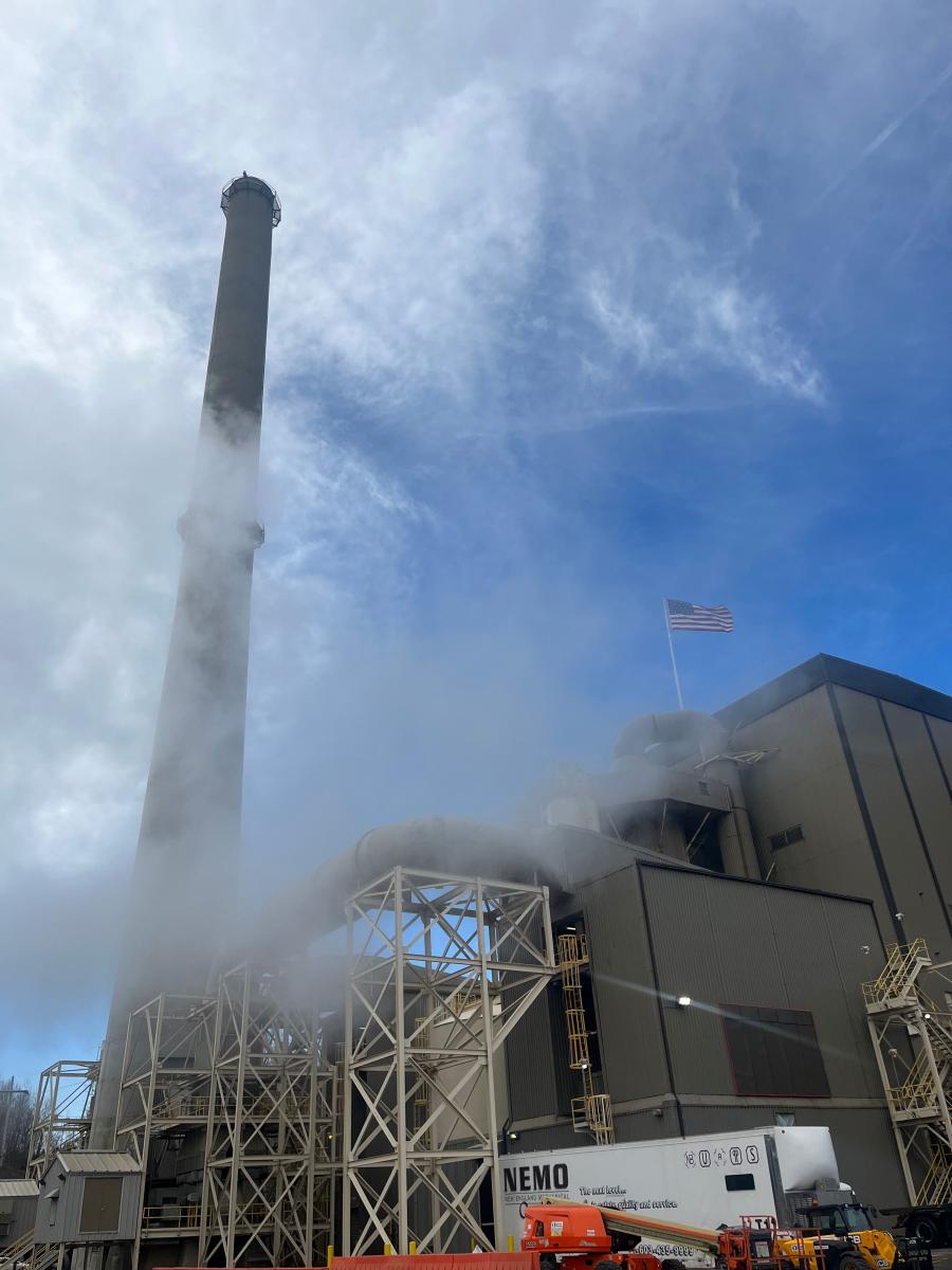 The smoke stack at the Wheelabrator in Millbury is clouded with smoke