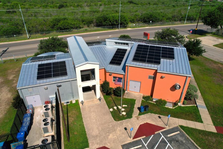 Aerial photo of solar panels on roof of the Jean Yates Community Center