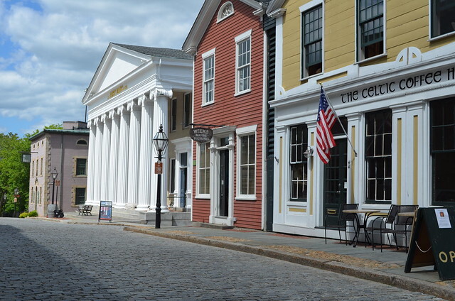 An image of historic buildings and a cobbled street in New Bedford